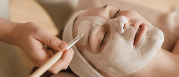 A woman getting facials